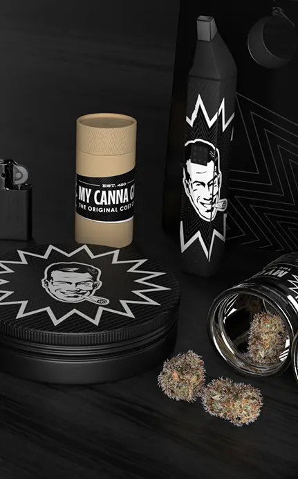 Bold black and white packaging design for My Canna Co featuring a retro-style mascot and dynamic starburst patterns.